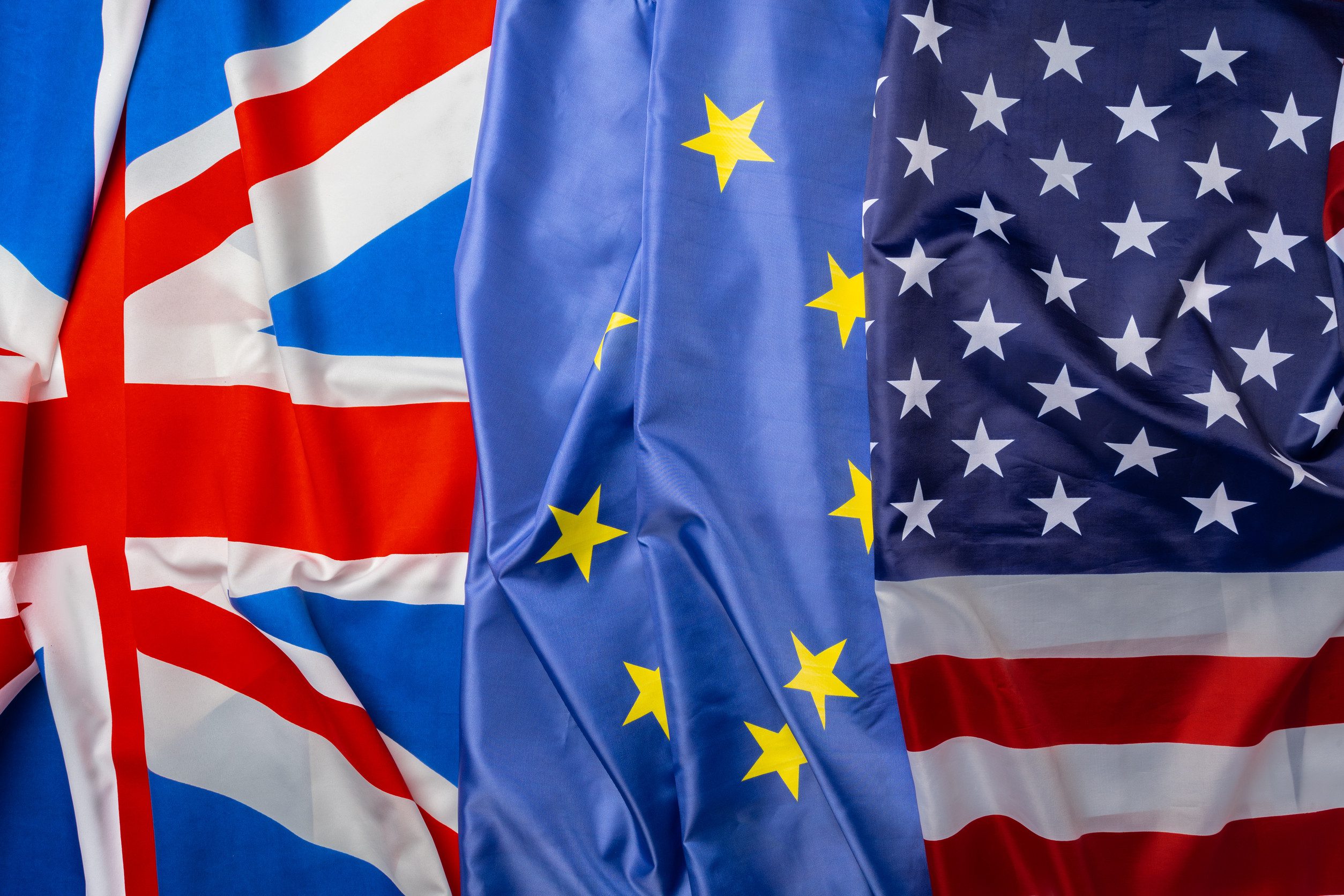 US, EU and UK flags