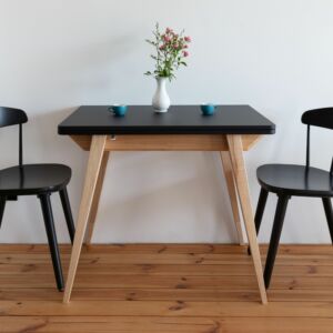 dining table for 4 persons extendable to 6. Black top made from MDF and solid ashwood table base. 
