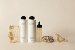 Part of Luare's collection: The Signature Shampoo. The Signature Conditioner, The Elixir Hair Oil & hair accessories 